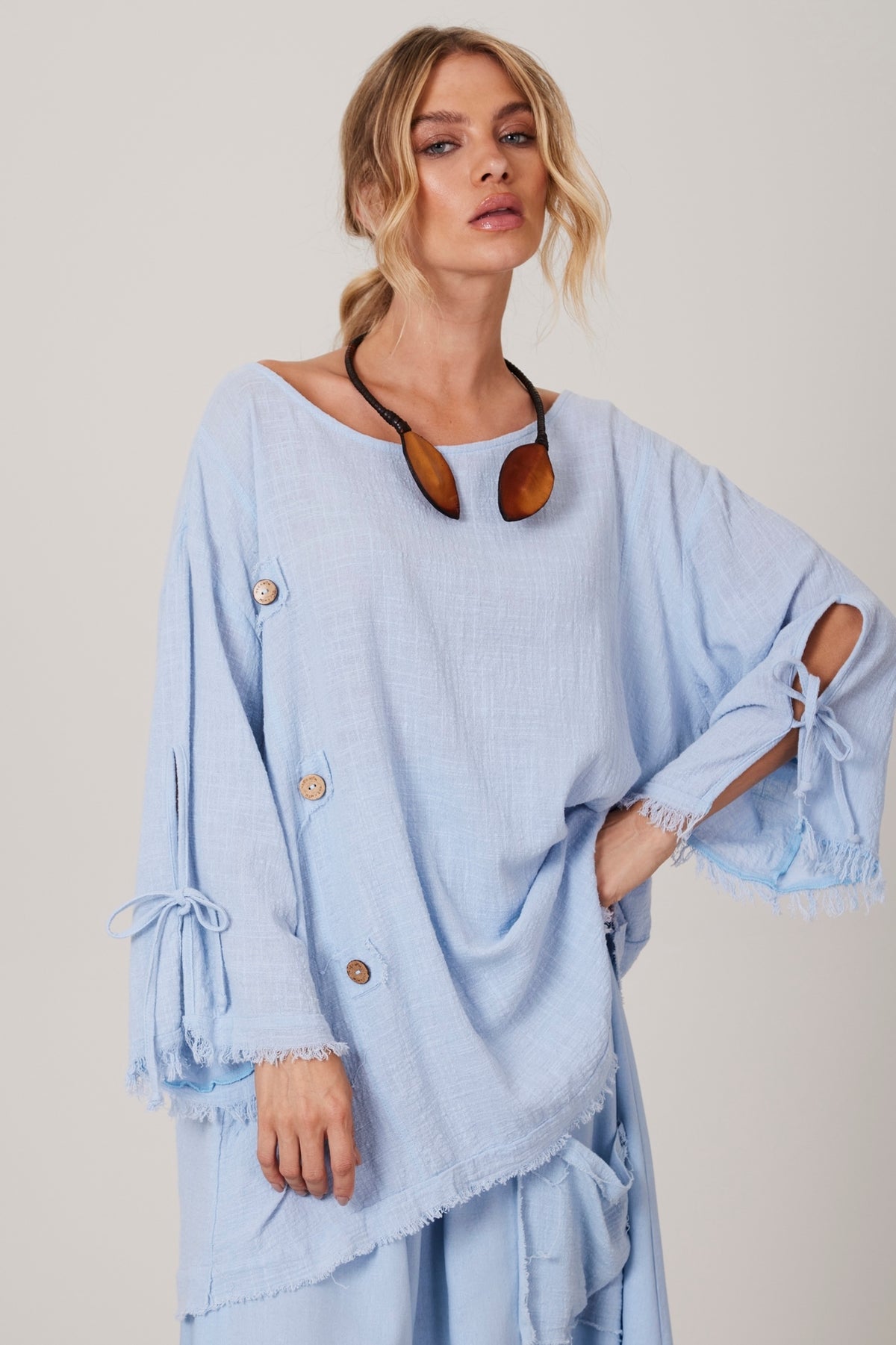 Light Blue Wide Canoe Neck Blouse Yacamim A28